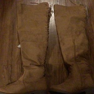 Thigh high lace up boot